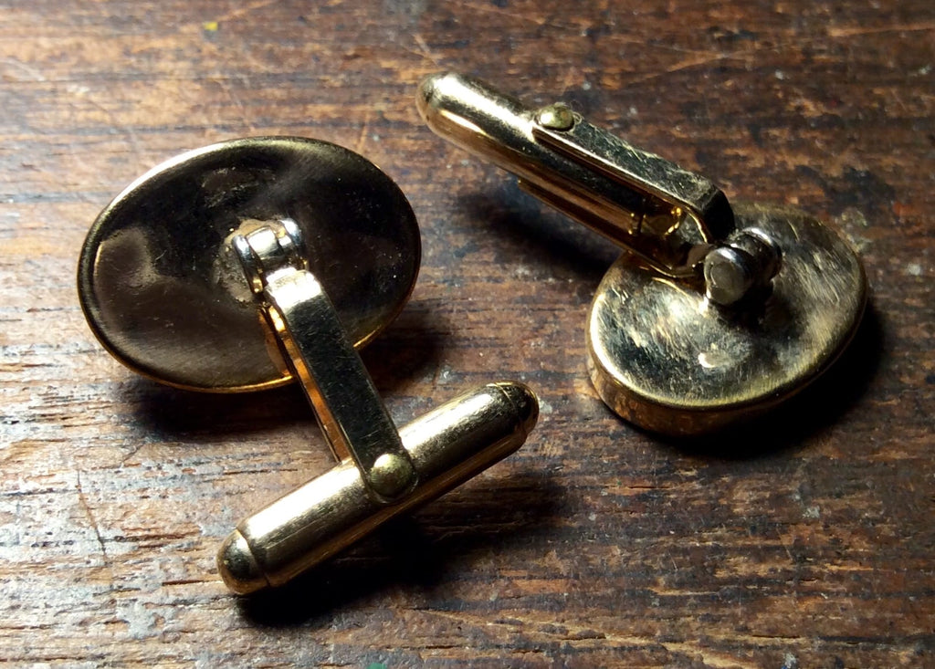 Gold-toned Metal Cufflinks On Wood; Cufflinks-mammoth Ivory, Luxury Accessory