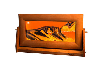 Exotic Sand Art By William Tabar: Wooden-framed Display With Orange And Black Swirling Patterns