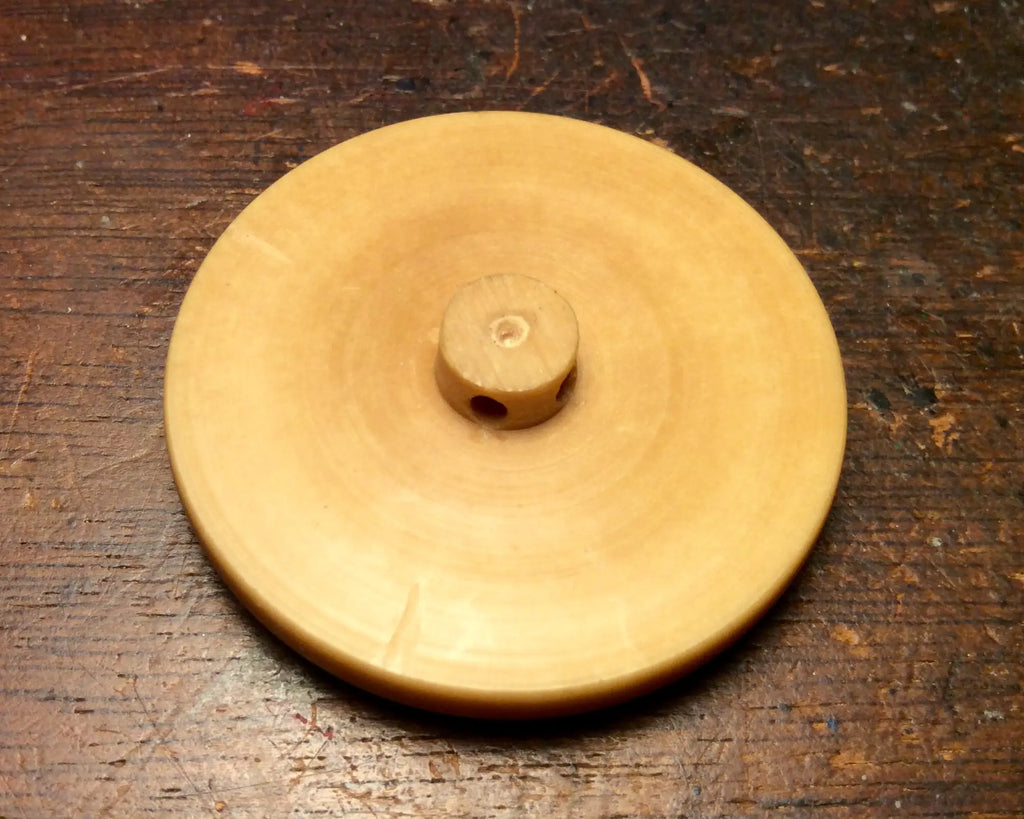 Mortgage (brag) Button - Micronesian Ivory Palm Nut